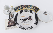 COLLINGWOOD: Small range including 1970s Scanlans cards (Len Thompson, Graeme Jenkin, Peter McKenna, etc.), a Nathan Buckley phone card, a Gavin Brown 1997 AFL Captain's Collection plate, a Magpies cup, saucer and plate set, etc. (14 items).