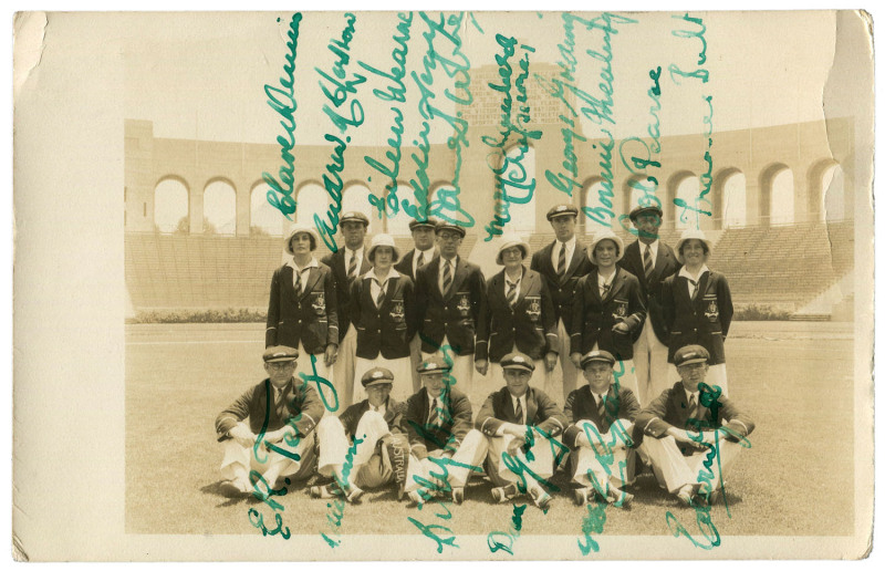 The Australian Team in Los Angeles 1932: A photographic postcard of the whole team in their Olympic Uniforms in front of the Olympic Stadium. The postcard has been signed by all 13 athletes and 3 officials, including Clare Dennis, Bobby Pearce and Duncan