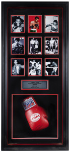 LIONEL ROSE [1948-2011]: An attractively framed W.B.F. boxing glove, signed by Rose and his trainer, Jack Rennie, presented together with nine photographs of Australia's World Bantamweight Champion. Overall 110 x 48cm.