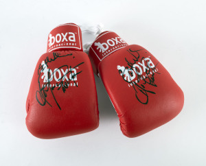A pair of BOXA Internacional gloves, both signed by ANTHONY MUNDINE.