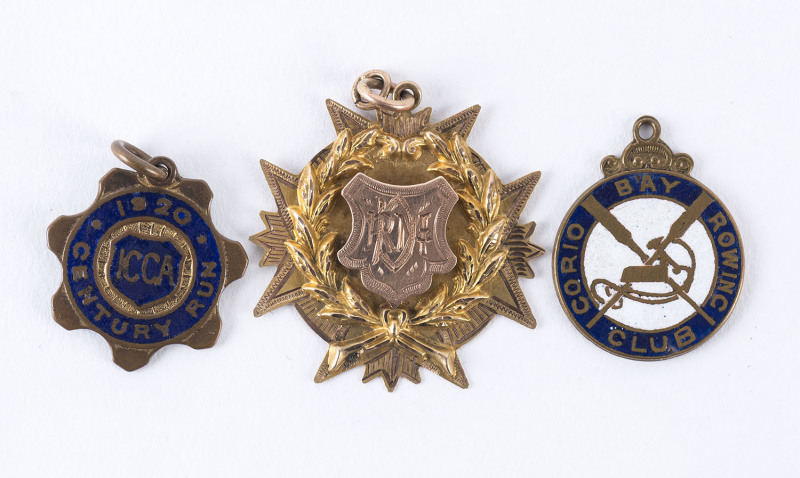 CORIO BAY ROWING CLUB: 1915 9ct gold medal awarded to the "Winners Maiden Pairs - Bairnsdale & Sale - 1915" in the original box (for Ed.G.Scott, Moorabool Str. Geelong); also two small enamel & brass badges/fobs associated with the club. (3 items).