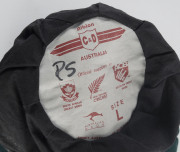 PAT SYMCOX'S SOUTH AFRICA "BAGGY GREEN" TEST CAP, green wool, embroidered Protea & "S.A.CRICKET" on front, Albion label inside endorsed "PS". [Symcox, a tall off-spinner, played 20 Tests 1993-99]. Ex South African cricket writer Brian Bassano, with letter - 4