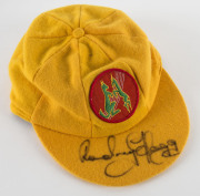 RODNEY HOGG'S REBEL TOUR TEST TEAM CAP, yellow wool with the logo to front (Kangaroo & Springbok on a red cricket ball), signed to the peak by Rodney Hogg. Attractively framed. [Hogg represented Australia in 38 Test matches between 1978 and 1984]. - 3