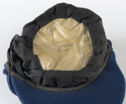 JOHN GLEESON'S NEW SOUTH WALES STATE TEAM CAP blue wool, embroidered 'NSWCA' shield logo on front. Attractively framed. [Gleeson played in 29 Tests for Australia between 1967 and 1972; he was first selected for the NSW Team in 1966. He was best known for - 4