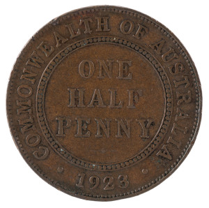 Coins - Australia: Half Penny: 1923 Half Penny, six clear pearls (scratch through 4th pair), impressive planchet flaw affecting 'R' of 'REX' on obverse, few scratches, F to VF, Cat. $3975 (as VF)