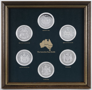 Coins - Australia: Decimal Proofs: 1976 "The Australian State Medals" limited edition set of six sterling silver proof medallions, housed in custom-made frame, some foxing to the accompanying booklet, however the frame is very fine, the coins Unc, retail $200.