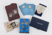 Coins - World: Balance of a consignment with ancients comprising three wallets of Chinese Cash Coins from 5 Dynasties & Roman Constantine Dynasty bronzes (2), also GB 1953 Coronation crown, 1965 Churchill Crowns (3), 1972 Silver Wedding coin set, 1977 Ju