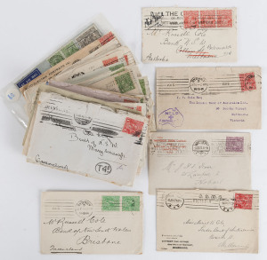 COMMONWEALTH OF AUSTRALIA: Postal History: KGV Heads on cover with ½d green pair on 1915 cover, Smooth Paper 1d red solos (8), including 1915 Fred Hagen (stamp dealer) handstamped "HELP/(Cross)/AUSTRALIA DAY/JULY 30TH" within "map" in violet, and a perf OS example on 1917 on District Pay Office cover, 1d violet solo on Mc Hugh Bros (Launceston) cover to Launceston, 1931 Perth Airmail to Melbourne with 2d strip of 3, etc; unchecked for varieties, probable slogan postmark interest, mixed conditio