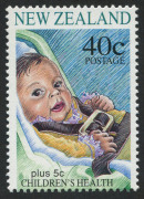 NEW ZEALAND: 1996 Health (Road Safety) 40c Teddy Bear sheet stamp CP:T68a, fresh MUH, Cat. NZ $2000, with an example of the re-drawn value provided for comparison. [Erroneously issued as the baby was depicted facing forwards in the car contrary to safety - 2