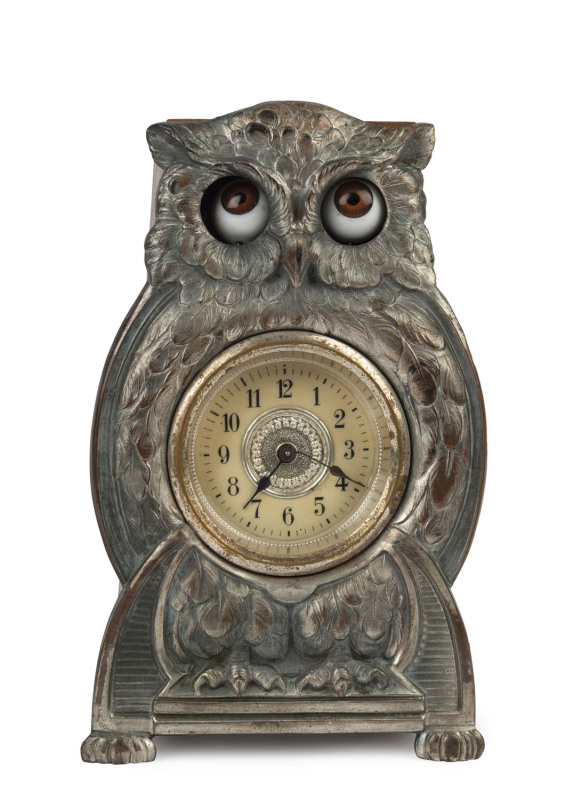 STARING OWL German novelty clock, 30 hour movement with animated eyes, silvered metal case on timber, circa 1925, 17cm high