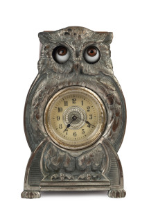 STARING OWL German novelty clock, 30 hour movement with animated eyes, silvered metal case on timber, circa 1925, 17cm high