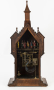 BLACK FOREST "Apostle" clock in the form of a cathedral, 12 apostles march across the central balcony every second hour, circa 1850, 89cm high - 2