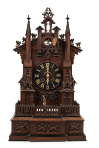 PHILIPP HAAS & SOHNE Black Forest shelf cuckoo clock with post guard figure which moves across the central balcony to the beat of the pendulum on a continuous two minute cycle, circa 1860. 69cm high