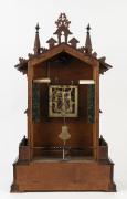 PHILIPP HAAS & SOHNE Black Forest shelf cuckoo clock with post guard figure which moves across the central balcony to the beat of the pendulum on a continuous two minute cycle, circa 1860. 69cm high - 2