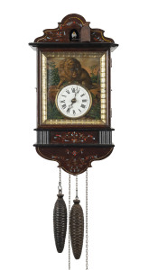 PHILIPP HAAS Black Forest blinker cuckoo wall clock, twin weight time and strike with oil painted zinc dial surround, lions eyes move with the pendulum beat, circa 1880. Suspension bridge in the form of a running rabbit, a Haas trademark. 45cm high