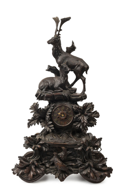 BLACK FOREST musical shelf clock with carved deer and pheasants, late 19th century, ​86cm high