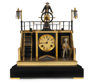 “Quarterdeck Helmsmen” French Industrial clock by Guilmet, 8 day time and strike movement housed in a gilt and silvered metal case on a black slate plinth, circa 1885.