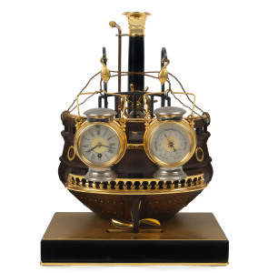 Nautical "Ships Stern" French Industrial clock in timber and metal case on black slate base by Guilmet, circa 1885, with hand written note on card "Presented to Captain William Hunt By The Nomad as a token of esteem and goodwill and to commemorate third successive victory of this team, December 1901", 40cm high