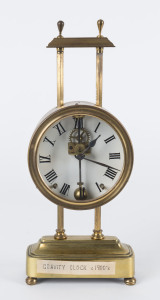English Gravity clock in brass case, circa 1900, 26cm high
