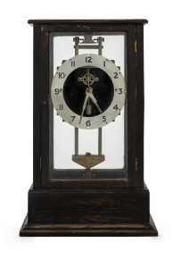 GRAVITY Clock in oak case, England, circa 1900, when the movement is elevated a tooth rack on one of the columns is engaged and the movements own weight will drive the clock for 24 hours, 35cm high