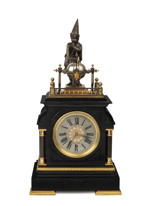 YOUNG WIZARD French chiming clock with automaton figural top, slate, bronze and ormolu with silvered dial, circa 1860, three train movement with duplex springs, top adorned with a nest of 4 bells which are struck by the wizard figure on the quarter hour.