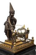 YOUNG WIZARD French chiming clock with automaton figural top, slate, bronze and ormolu with silvered dial, circa 1860, three train movement with duplex springs, top adorned with a nest of 4 bells which are struck by the wizard figure on the quarter hour. - 2