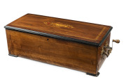Swiss coin operated music box in walnut case, circa 1885,&nbsp;