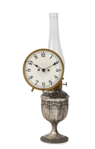 American night light kerosene lamp clock, silver plated base with milk glass dial in brass bezel, Hinks single burner, 19th century, 42.5cm high