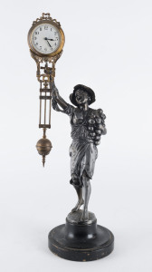 ONION BOY Mystery clock by Junghans, German, late 19th early 20th century, 8 day brass cased time piece, white metal statue standing on ebonized wooden base, 40cm high