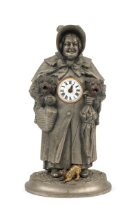 German tick tack figured mantel clock, cast metal with dog tongue pendulum, 19th century, 27cm high