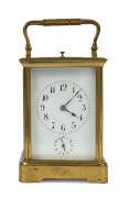 A French alarm repeater carriage clock in brass case, 19th century, 18cm high