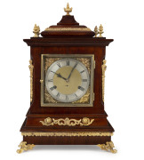 WILCOX Canadian bracket clock, strikes on 5 gongs, mahogany case with ormolu mounts adorned with five finials and silvered dial, circa 1888, movement signed "WILCOX, CANADA". Note: the pendulum mounts from under the clock case. 48cm high