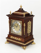 WILCOX Canadian bracket clock, strikes on 5 gongs, mahogany case with ormolu mounts adorned with five finials and silvered dial, circa 1888, movement signed "WILCOX, CANADA". Note: the pendulum mounts from under the clock case. 48cm high - 2