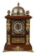 ANSONIA "Antique Number 1" mantel clock with enamel cartouche numerals, walnut case with ornate gilt metal decoration, circa 1894, ​46cm high