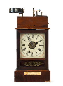 H.J. DAVIES "Illuminated Alarm Clock" American shelf model in walnut case with paper instructions and 1859 patent on the back, rare. 41cm high