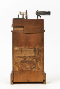H.J. DAVIES "Illuminated Alarm Clock" American shelf model in walnut case with paper instructions and 1859 patent on the back, rare. 41cm high - 2