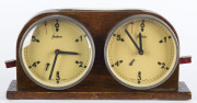 OMIKRON Hungarian chess clock in timber case, circa 1930, 10cm high