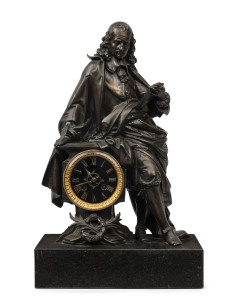 French figural mantel clock of a scholar, bronze finished cast metal and black slate base, 19th century, 50cm high