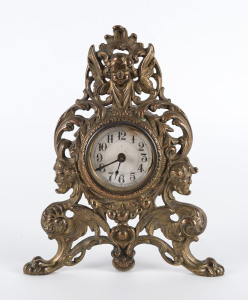 WESTCLOX Timepiece in ornate cast metal case, late 19th century, marked "Made By Westclox, LaSalle, ILL. U.S.A.", 26cm high