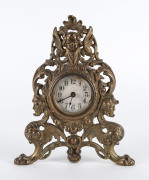 WESTCLOX Timepiece in ornate cast metal case, late 19th century, marked "Made By Westclox, LaSalle, ILL. U.S.A.", 26cm high