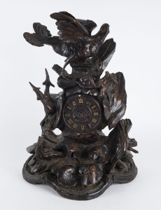 BLACK FOREST Carved mantel clock with French time and strike movement, late 19th century, 53cm high