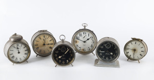 Six assorted bedside alarm clocks including Ansonia "Clatter", Westlox "Big Ben", "Jack O'Lantern", "Black Bird", and others, early 20th century, 16cm high