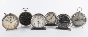 Six assorted antique and vintage alarm clocks including Ansonia, Jewelex, Westclox and others, the tallest 17cm high