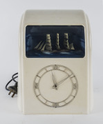 Art Deco Vitascope cream bakelite electric automaton mantel clock with moving ship mechanism, circa 1930s, 33cm high