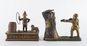 Two Mechanical Banks, TRICK DOG and TEDDY AND THE BEAR, painted cast iron, the taller 19cm high