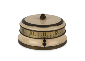 Rotary or Tape Measure clock, 30 hour novelty timepiece by Lux Clock Co. Conn. U.S.A. circa 1941, 12.5cm diameter