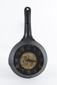 PAN-AMERICAN Exposition 1901 Buffalo, U.S.A novelty frying pan wall clock, circa 1900, marked "C.F. CHOUFFER, JEWELER, BUFFALO, N.Y.", 29cm high
