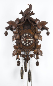 BLACK FOREST double door cuckoo hanging clock with quail decoration, circa 1900, 63cm high