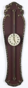 GRAVITY Wall clock with enamel dial, circa 1919, this type of clock was originally used in the mid 18th century. The movement is wound by raising the clock up the rack and allowing it's own weight to drive the mechanism, ​61cm high