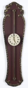 GRAVITY Wall clock with enamel dial, circa 1919, this type of clock was originally used in the mid 18th century. The movement is wound by raising the clock up the rack and allowing it's own weight to drive the mechanism, 61cm high